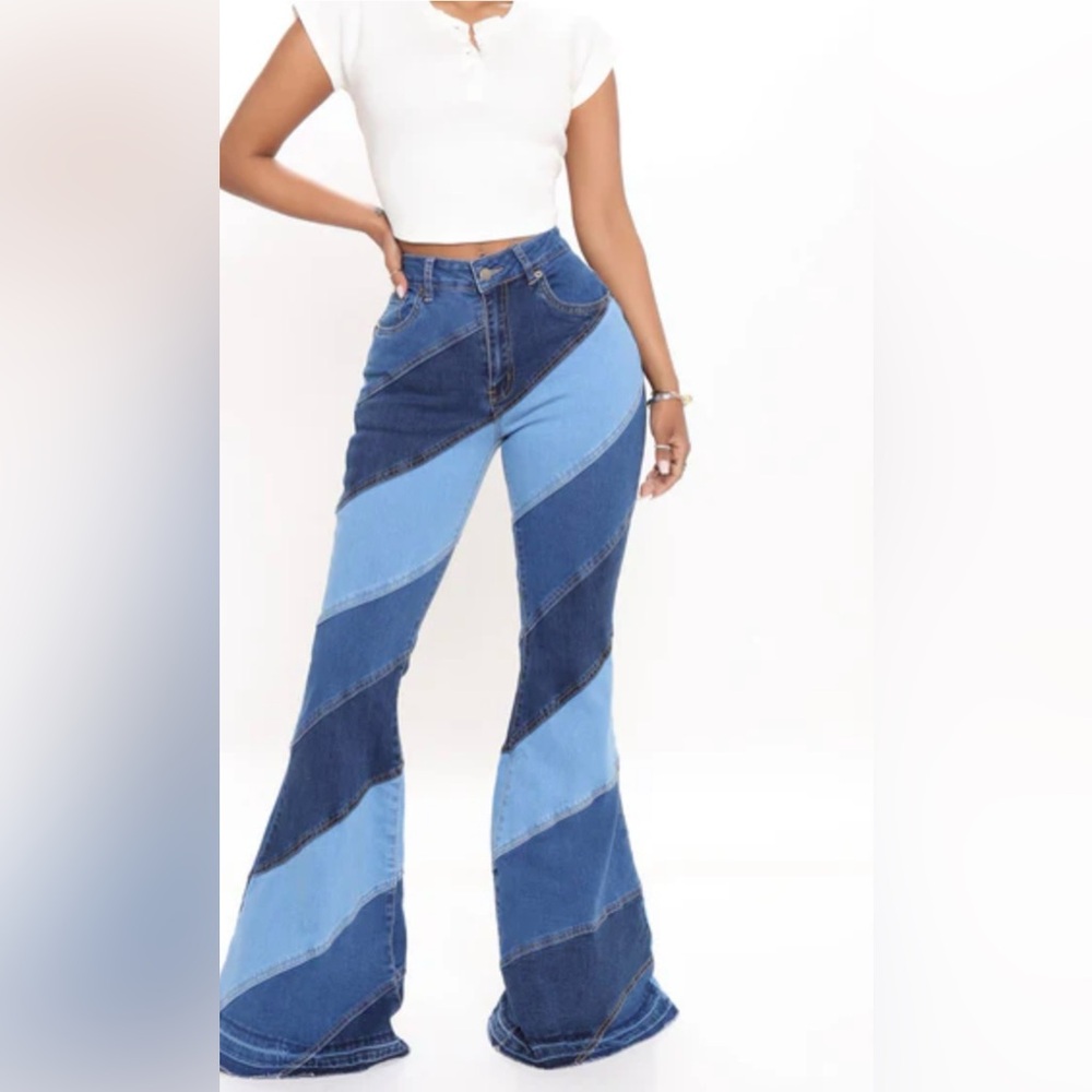 SOLD

Spiralling out of control, patchwork, flare Jeans